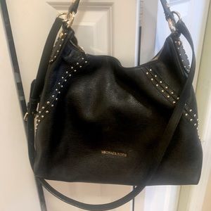 Michael Kors Black pebbled leather and gold embellishments